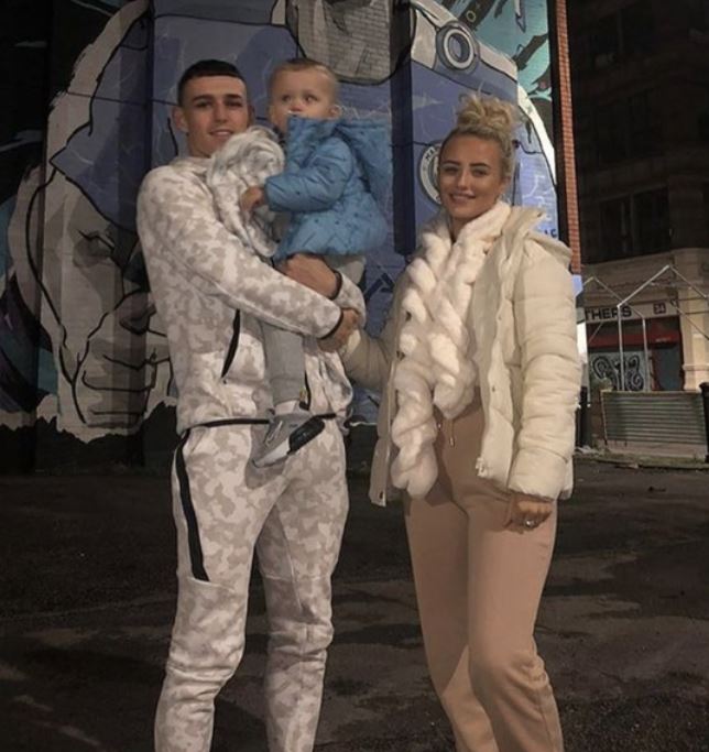 Rebecca with her boyfriend Phil and son Ronnie Foden