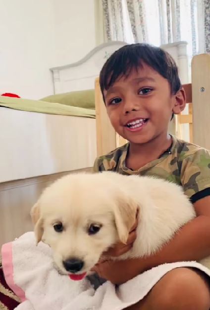 Shora's brother with dog