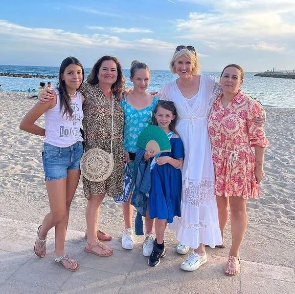 Amelia Reynolds with her daughters and friends