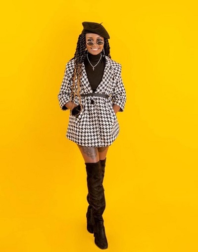 Georgina Njenga height is 5 feet 4 inches tall