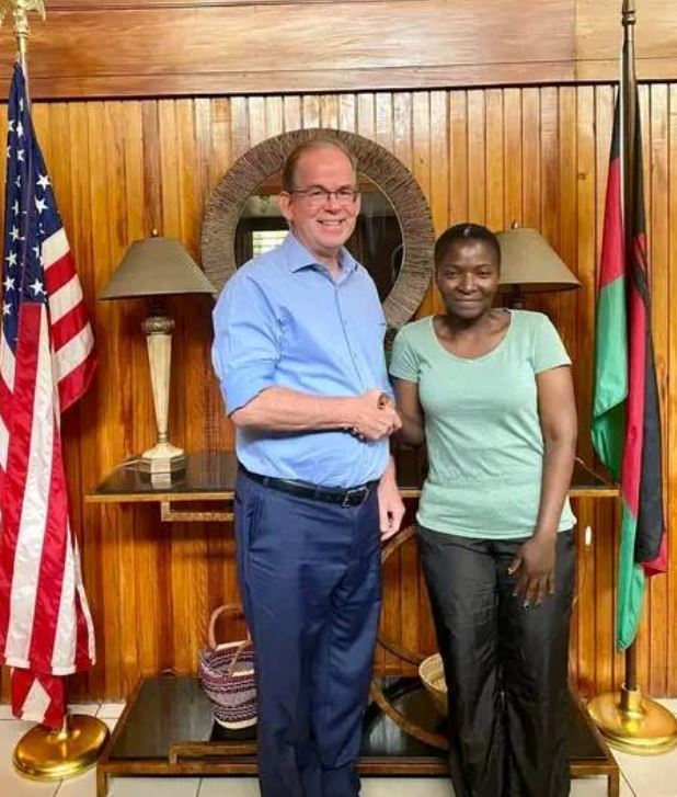 Martha Chizuma with ambassador David Young