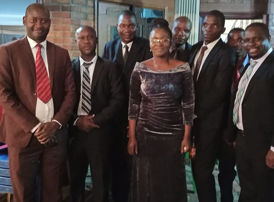 Martha Chizuma with other government officials