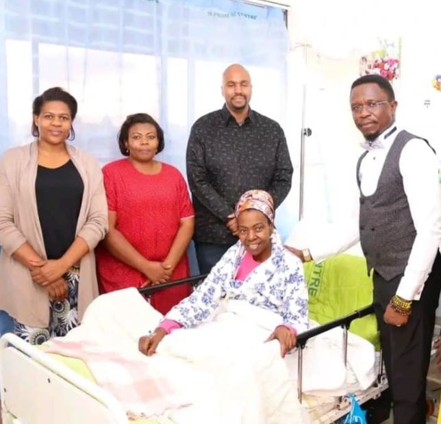 Martin Kasavuli with his mom and other family members