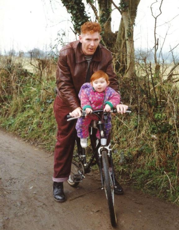 A childhood image of Ella Whelan with her dad Denis Russell