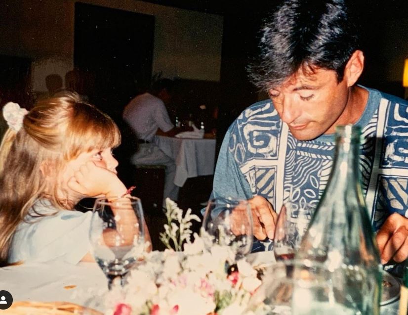 A childhood image of Lucy Martin with her dad