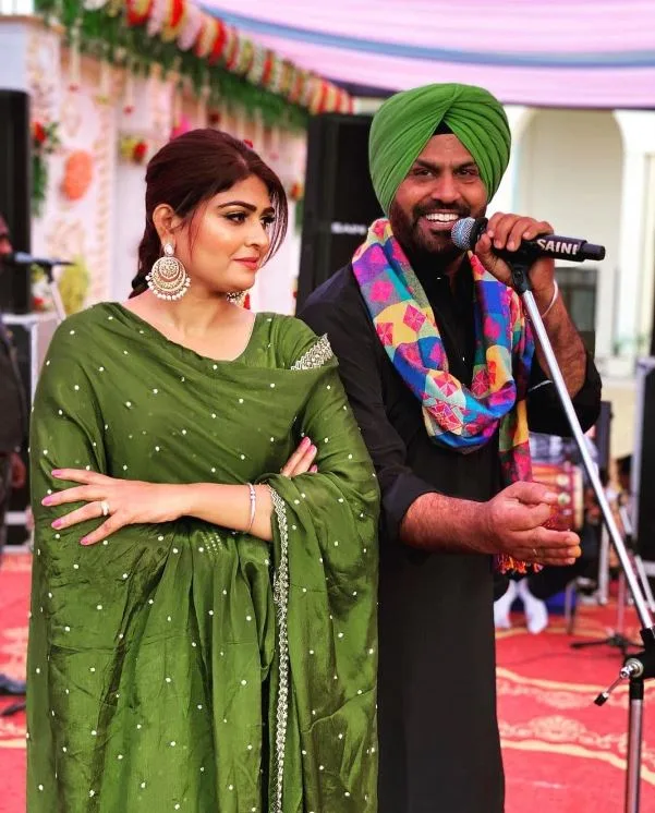 Aman Rozi with singer Atma Singh