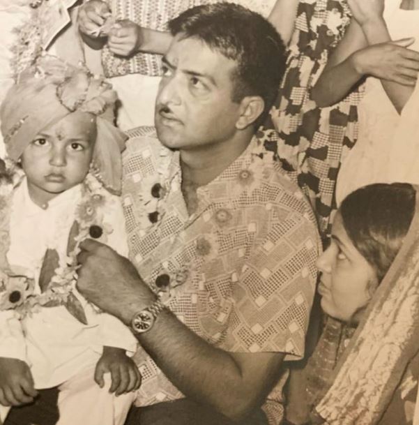 An old image of Shakti Sood with his son and wife