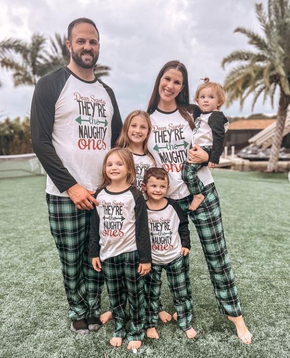 Janelle McAloon with her husband and kids