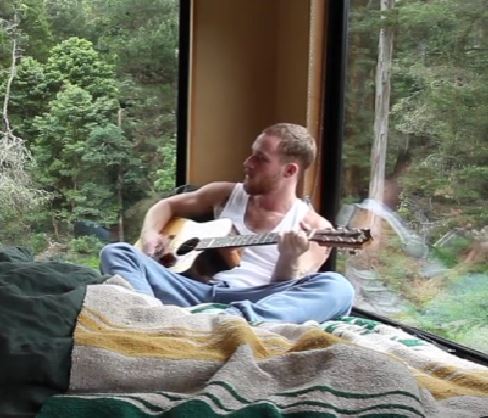 Jordie Hansen plays guitar