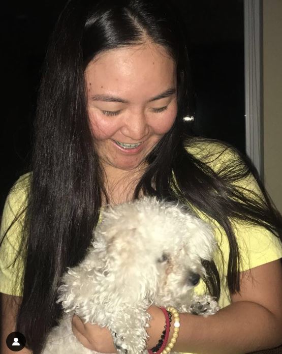 Allisen Corpuz with her dog