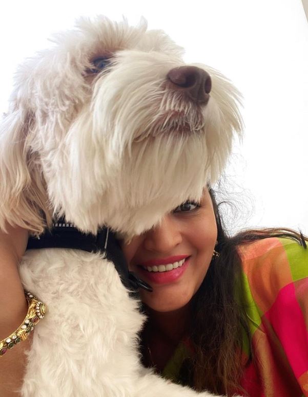 Renu Desai with her dog Pluto