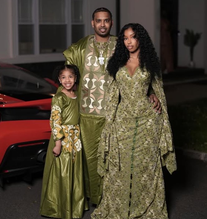 Amarie Burgos with her husband and daughter