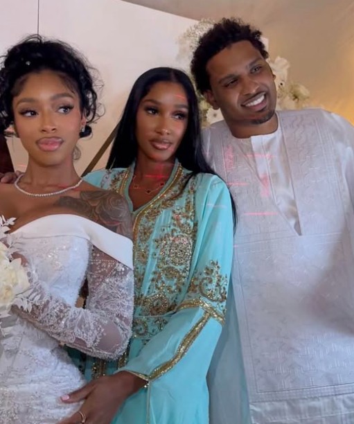 Amarie Burgos with her sister and husband