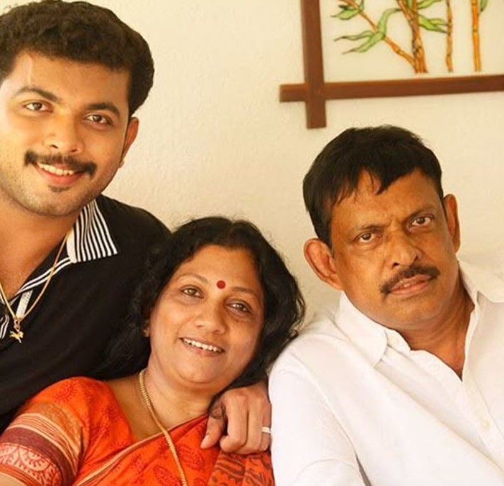 E.A. Rajendran with his wife and son