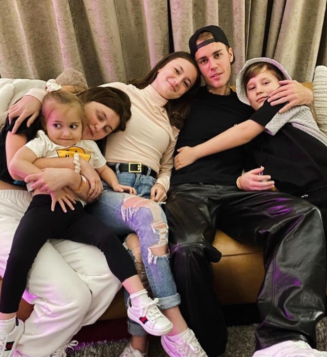 Allie Rebelo with her siblings