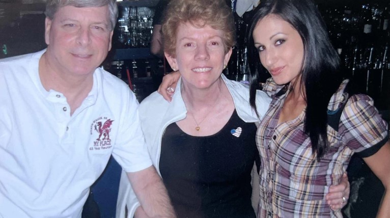 Amie Harwick with her parents
