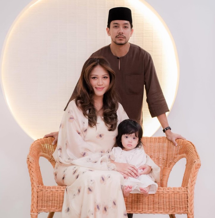Hafeez Mikail with his wife and daughter