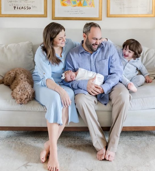 Kristen Holmes with her husband