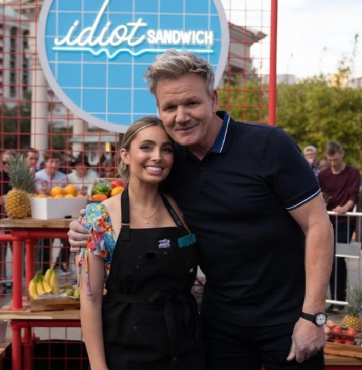 Lexi Hensler with Chef Gordon Ramsay in a still from the American cooking competition TV series titled ‘Idiot Sandwich’ (2024)