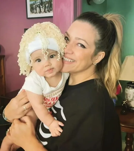 Mia Swier with her kid
