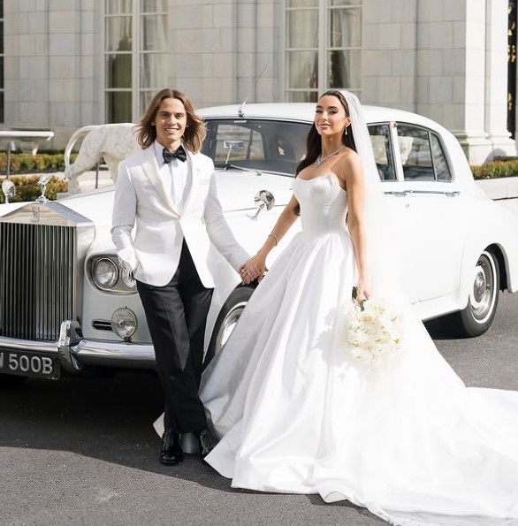 Casey Adams with his wife