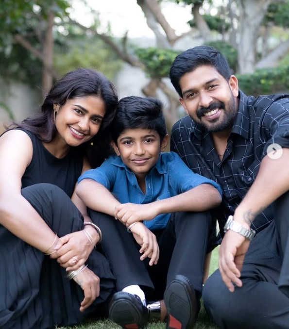 Amrutha Abishek with her husband and kid