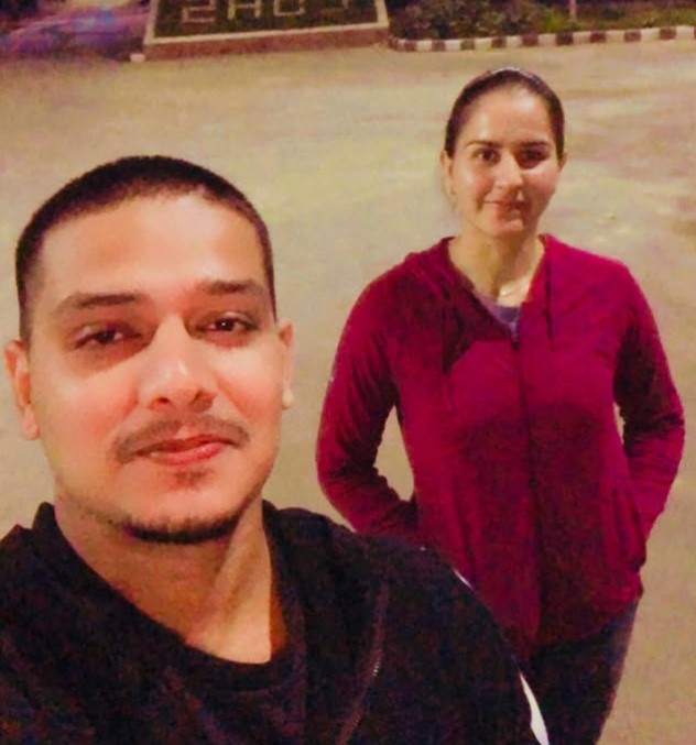 Asha Saharan and her husband