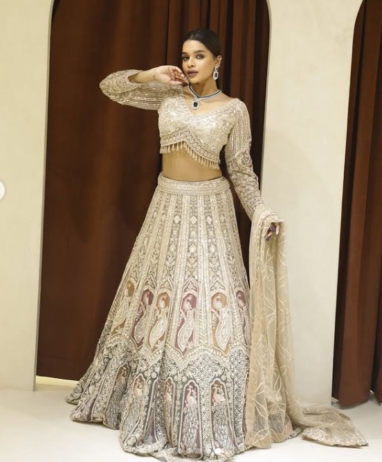 Veena Jessi height